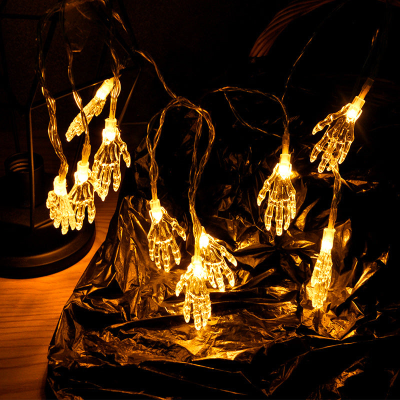 Skeleton hand LED string lights unlit laid flat showing all 10 hands